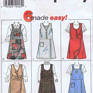 May include: A sewing pattern for six different styles of dresses. The pattern is for sizes 4, 6, and 8. The pattern is called "Simplicity made easy!" and has a barcode on the top left corner.