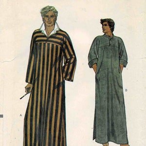 May include: A sewing pattern for two long, loose-fitting robes. The robe on the left is black and gold striped with a collar. The robe on the right is solid green. The pattern is called "Very Easy Vogue Patterns" and the number is 7255. The size is small.