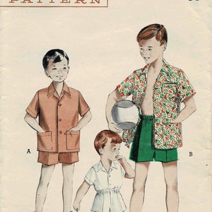 May include: A vintage sewing pattern for boys' shorts and shirts. The pattern is from Butterick and is size 12, chest 30. The pattern is priced at 35 cents.
