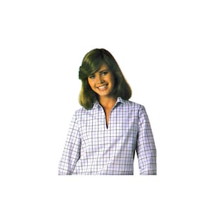 May include: A woman wearing a white and black checkered shirt with a collar and a button-up front.