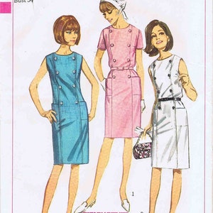 May include: A vintage sewing pattern for a sleeveless dress with a double-breasted button closure. The pattern is for size 14 and bust 34. The pattern is from Simplicity and is called "Personal-Fit Patterns".