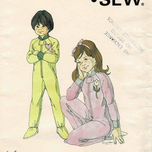 May include: A vintage sewing pattern for children's pajamas. The pattern is for sizes 4-6-8 and includes a transfer. The pattern shows two children wearing pajamas, one in yellow and one in pink. The pattern is titled "Kwik-Sew Pattern Co., Inc."