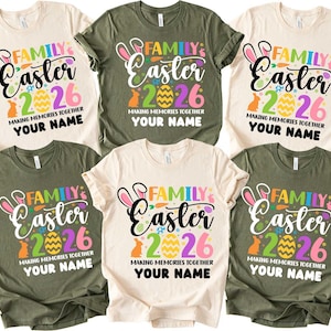 Op de afbeelding: Zes T-shirts in verschillende kleuren, waaronder crème, olijfgroen en beige. Elk shirt heeft een kleurrijke afbeelding met de woorden "Family Easter 2026" en de zin "Making Memories Together Your Name."