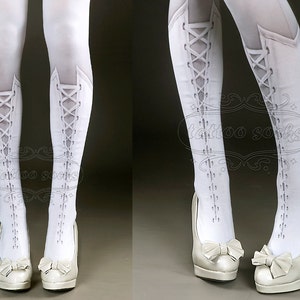 May include: White tights with a lace-up boot design printed on the legs. The tights are worn with white high-heeled shoes with a bow detail.