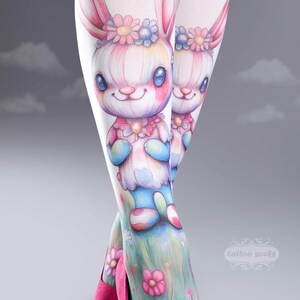 May include: A white ceramic mug with a black handle and the text "But First, Coffee" in a black, bold font. The mug is likely 11-15 ounces in size, perfect for a morning beverage.