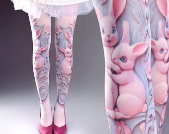 May include: Pink and blue patterned tights featuring a repeating design of rabbits and floral elements. The tights are paired with pink heels. The overall design is whimsical and decorative, with a soft color palette.