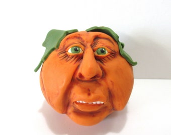 Pumpkin with a sweet face table top decoration