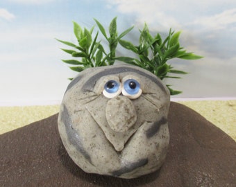 Hand sculpted gray rock guy for planters or gardens