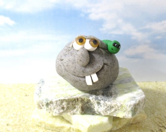 Rock person and green inch worm