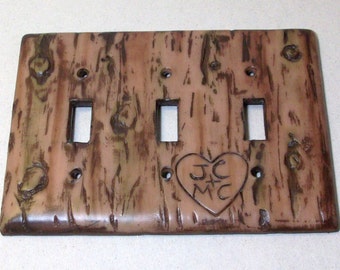 Carved love initials in a Bark of a tree triple toggle light switch cover