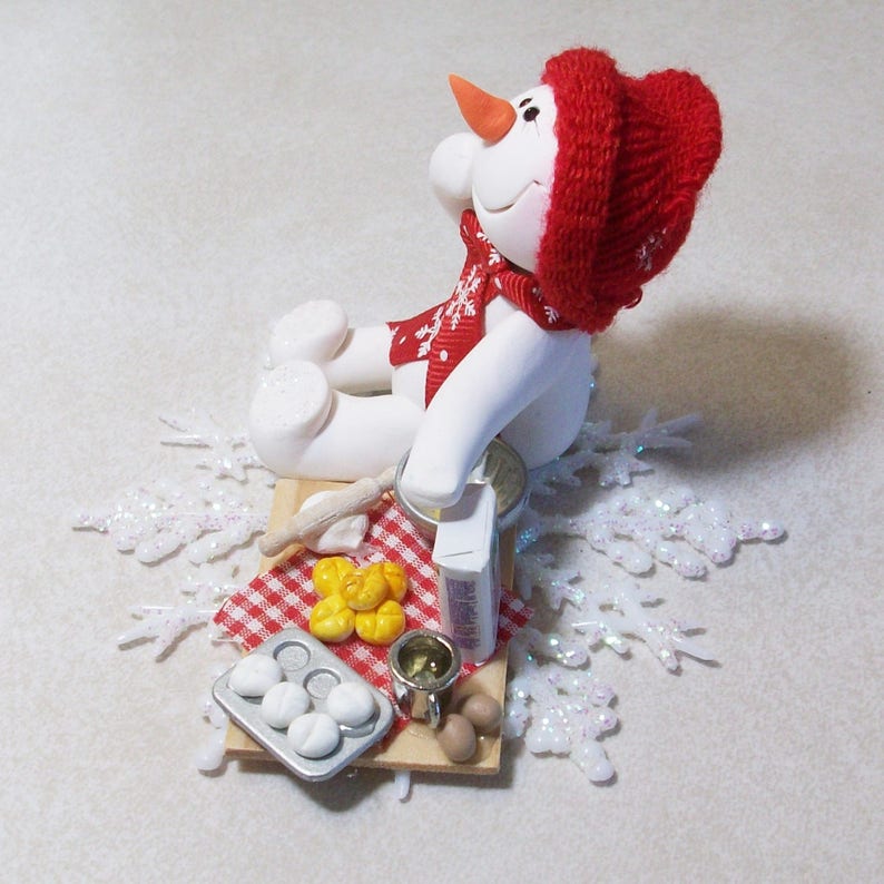 Ready to do some baking Snowman ornament with snowflake base polymer clay snowman