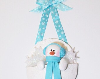 Snowman ornament in a snowflake pocket, polymer clay snowman