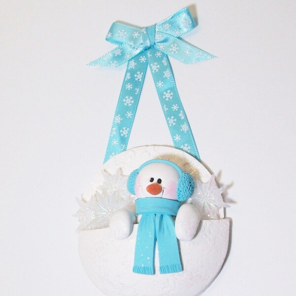 Snowman ornament in a snowflake pocket, polymer clay snowman