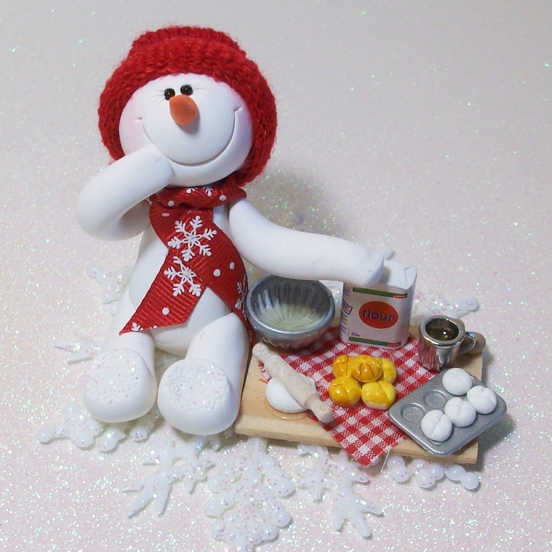 Ready to do some baking Snowman ornament with snowflake base polymer clay snowman