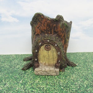 Miniature tree stump house