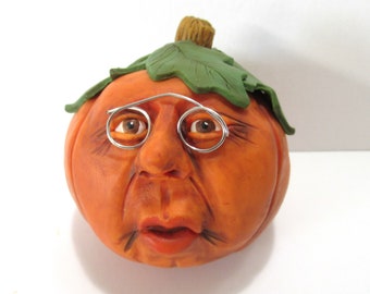 Pumpkin with glasses table top decoration