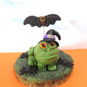 Halloween Frog with witch hat, a bat and spiders  polymer clay figurine