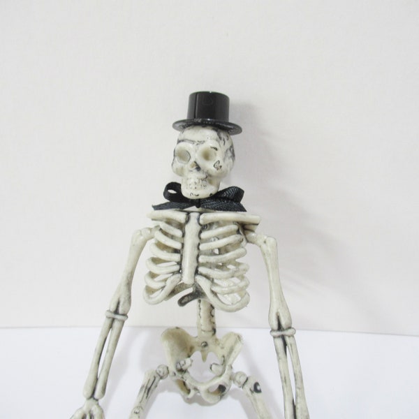 6 inch Skeleton with a top hat and bow tie