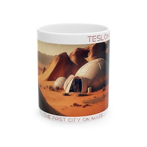 May include: White ceramic mug with a colorful image of a futuristic city on Mars. The text "TESLONE" and "THE FIRST CITY ON MARS" is printed on the mug.