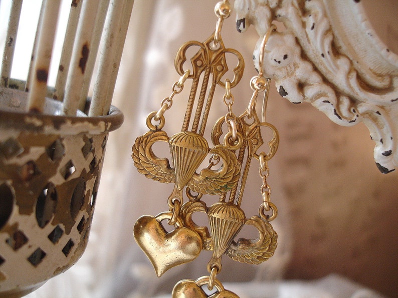 leap of faith limited edition vintage assemblage earrings artisan assemblage vintage winged parachute paratrooper link gold heart gf wires