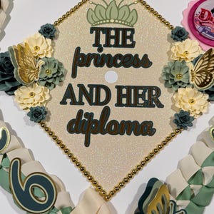 May include: A handmade wooden sign with the text "Welcome" in a playful font. The sign is painted white with a distressed finish, and features a decorative floral design. It measures approximately 12 inches wide and 6 inches high.