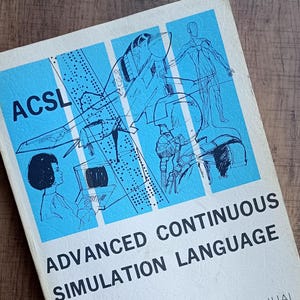May include: Vintage "Advanced Continuous Simulation Language" user guide. The cover features blue and white illustrations of a plane, figures, and a woman. The title is in bold black font, with "ACSL" at the top.