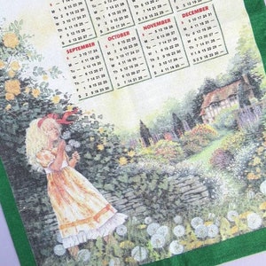 Vintage Tea Towel: 2000 Calendar, The People's Friend, girl blowing dandelion seeds in country cottage garden, retro calendar dish towel image 1