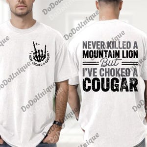 A white t-shirt with a graphic design and text on the back.