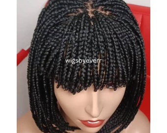 Handmade braided short box braid fringe wig made with  full lace  . Made in a front part to give the stylish look.