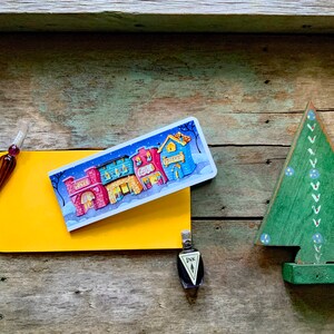 Carte mince Petite ville et enveloppe assortie-Magasin de jouets-Librairie-Marché-Café-Vacances d'hiver Carte mince-Carte de voeux Valerie Walsh