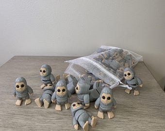 Mini Bigfoot articulado gris