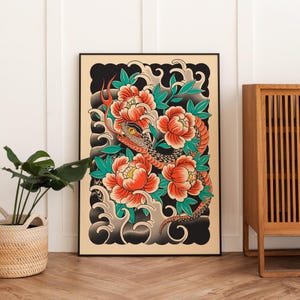 May include: A framed art print featuring a detailed illustration of a snake intertwined with vibrant red and orange peonies and green leaves. The artwork is set against a backdrop of black and cream-colored waves, creating a striking contrast.