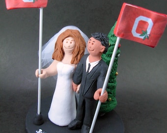 El novio hispano se casa con el pastel de bodas de la novia caucásica Topper, el pastel de bodas del novio afroamericanoTopper, el regalo de aniversario de bodas del estado de Ohio.