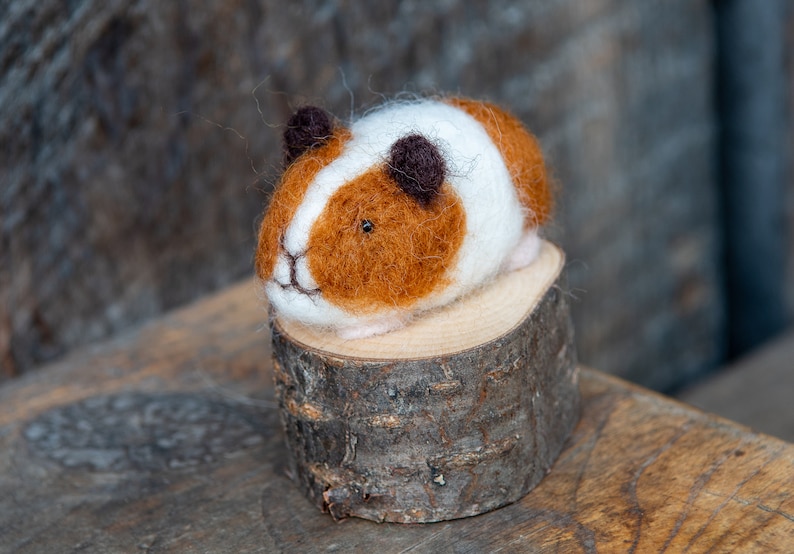 completed felted guinea pig