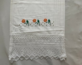 Hand-embroidered table runner with white and yellow lace (flowers)