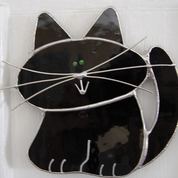 Gato negro de vidrio manchado