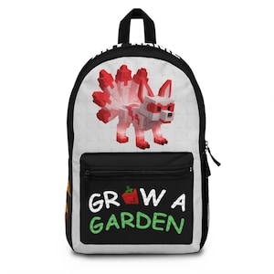 May include: Black and white backpack featuring a pixelated fox with red accents and a fluffy tail. The front pocket displays the text "GROW A GARDEN" in white and green. The backpack has a black zipper and a top handle.