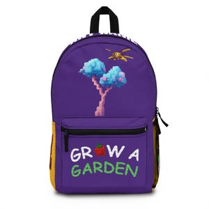 May include: Purple backpack with a front pocket and side mesh pocket. The backpack features a pixelated tree design with blue and pink accents, and a flying insect. The words "GROW A GARDEN" are printed on the front.