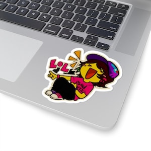 May include: A sticker featuring a cartoon character laughing hysterically. The character is wearing a pink shirt with the text "Tough Guy", black pants, and a purple hat. The word "LOL" is prominently displayed above the character.