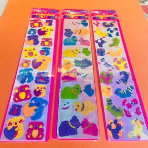 Bandes d&#39;autocollants Lisa Frank irisées vintage - Lunettes de soleil ou ours en peluche au choix