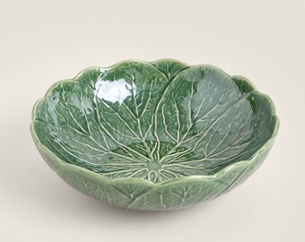 Ceramic salad bowl in the shape of a cabbage leaf, produced from handmade ceramics and decorated with organic pottery