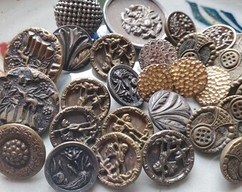 Thirty (30) Antique Metal Charm String, Picture, Perfume, Buttons. Measure approx 1 1/8" to 5/8". Have wear, age. As Found.