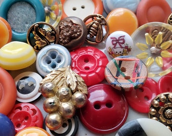 Forty Five (45) Assorted, Cute, Vintage and newer, Plastic Buttons. Measure about 7/8" and under.