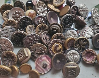 Fifty Eight (58) Antique Metal Picture Buttons. Measure approx 3/8" to 5/8". Have wear, age. As Found.