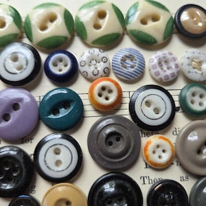 Thirty Eight (38) Antique China Buttons. Measure about 5/8&quot; and below. Light wear.