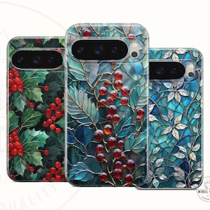 May include: Three phone cases with botanical designs. The cases feature images of holly with red berries, and stylized leaves with red berries, and white leaves. The cases have a glossy finish and are designed to fit a phone.