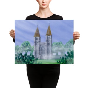 May include: A painting of a gray stone church with two tall towers and a large stained glass window. The church is surrounded by green trees and a blue sky.