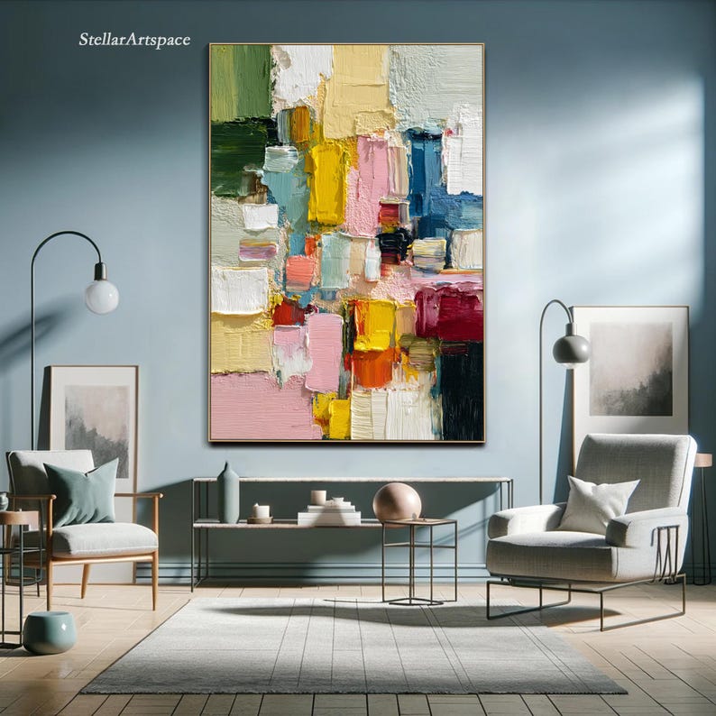 May include: Abstract oil painting with a gold frame. The artwork features a textured, colorful composition of rectangular shapes in shades of pink, yellow, blue, green, and white. The text "StellarArtspace" is in the upper left corner.