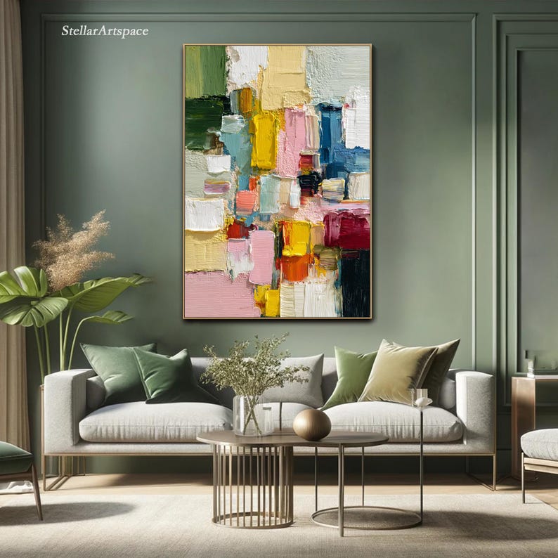 May include: Abstract oil painting with a gold frame. The artwork features a colorful composition of rectangular shapes in shades of pink, yellow, blue, green, and white. The text "StellarArtspace" is in the upper left corner.