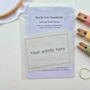 May include: A pack of Beech Tree Handmade stick and stitch patches. The package features a white patch with the text "Your words here" and a clear plastic covering. The text "Beech Tree Handmade" and "Stick and Stitch Patches" are also visible.